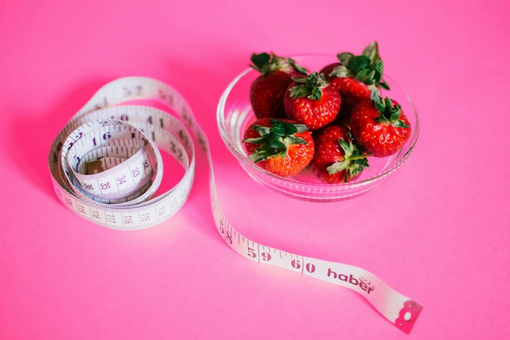 strawberries and measuring tape for exercise practices